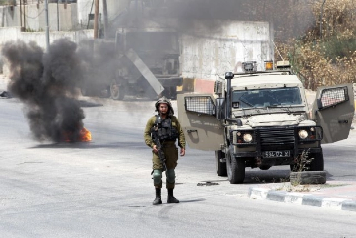 Israeli officer and two Palestinians dead in West Bank gunfire