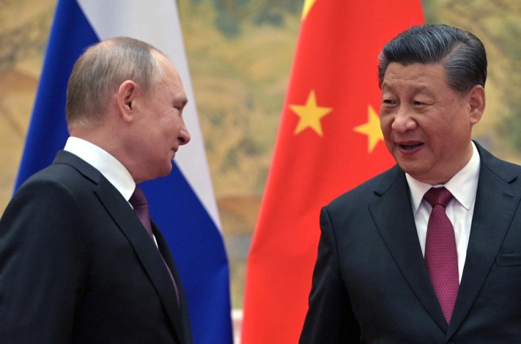 China's Xi backs Putin at start of high-stakes visit to Russia