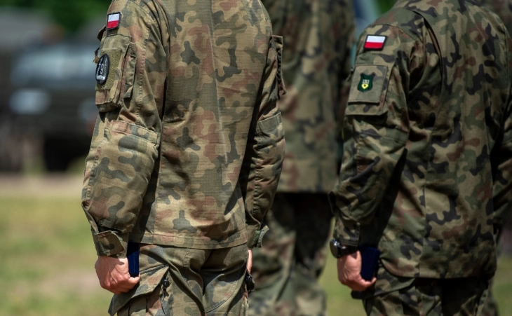 Poland sending more troops to border with Belarus