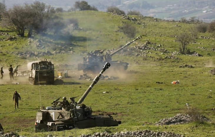 Israeli military and Hezbollah trade fire across Lebanese border