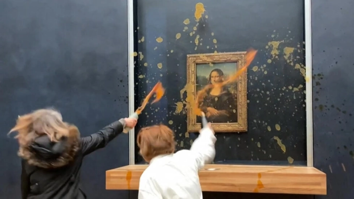 Еколошки активисти истуриле супа врз стаклото што ја штити Мона Лиза