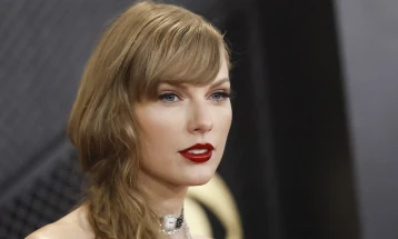 Swift becomes first to win album of the year four times at Grammys