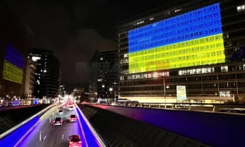 EU buildings glow in Ukrainian colours