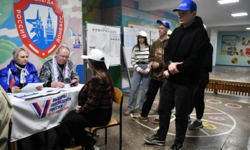 Russia reports high voter turnout for election with little suspense