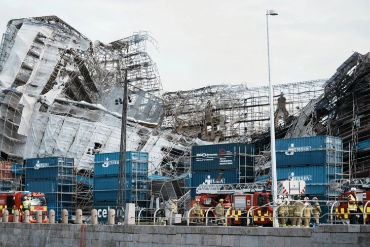 Parts of walls of Copenhagen's Old Stock Exchange collapse after fire