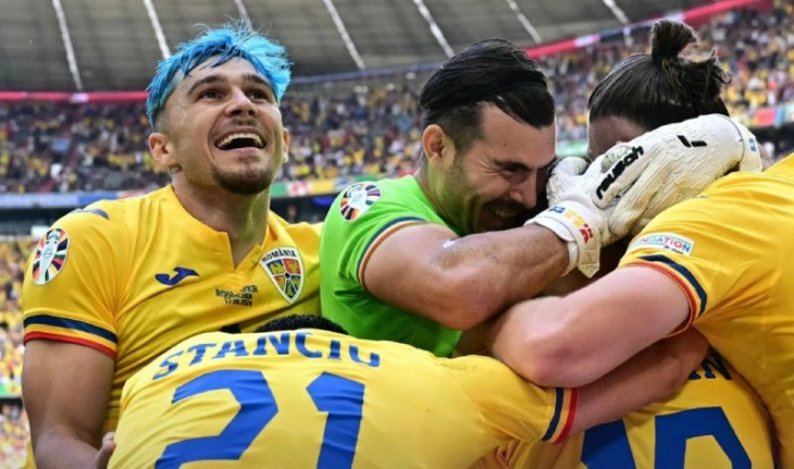 Romania get first Euro win in 24 years with 3-0 over Ukraine