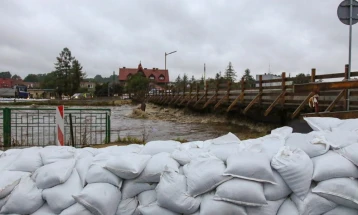 Poland confirms first flood death as rivers swell in south-west