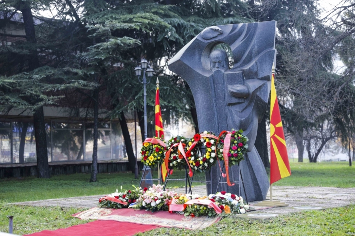 Delegations lay flowers at St. Clement of Ohrid monument in Skopje