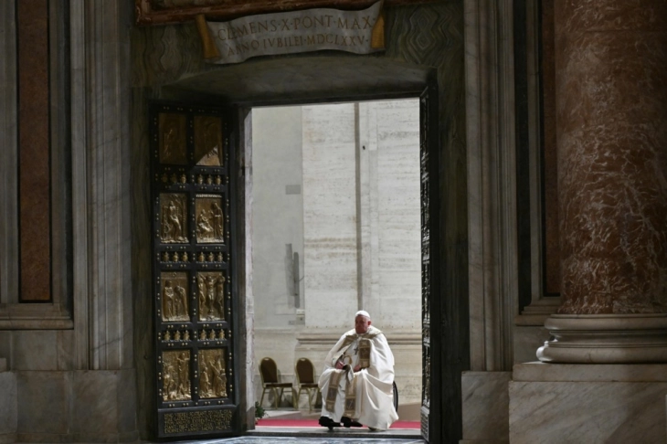 Pope Francis opens Holy Door of St Peter's Basilica, marking Jubilee