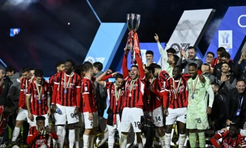 Abraham hits winner as AC Milan beat rivals Inter to win cup