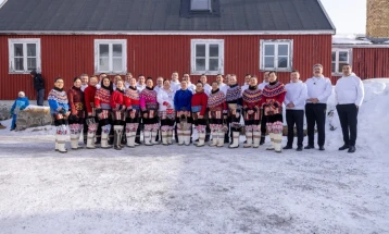 Greenland's new government takes office as Trump watches on