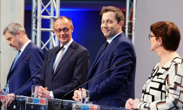 Merz vows 'strong plan' for 'stable' Germany as coalition deal sealed