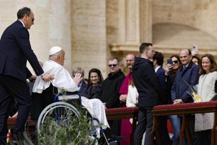 Pope appears in St Peter's Square after Palm Sunday Mass