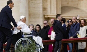 Pope appears in St Peter's Square after Palm Sunday Mass