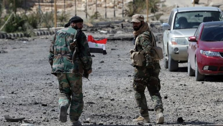 Clashes halted after 22 people were killed near Damascus, monitor says