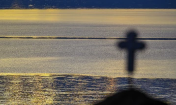 Mainly sunny skies, intermitted showers by the end of the day