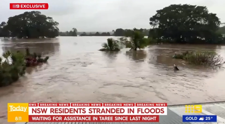 Residents trapped on roofs as floods hit Australia's east coast