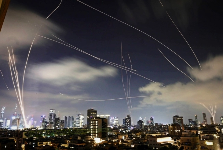 Rockets and words continue to fly in Israel-Iran conflict