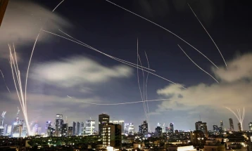 Rockets and words continue to fly in Israel-Iran conflict