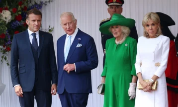 British King and Queen roll out red carpet for France's Macron