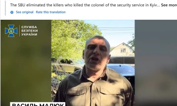 Kiev reports killing two held responsible for murder of intel officer