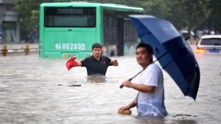 At least 34 dead following heavy rains and flooding in Beijing region
