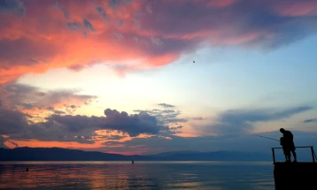 Weather: Mix of cloud and sunny spells, showers later; high 34°C