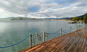 Weather: Partly cloudy skies with afternoon showers; high 35°C