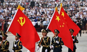 China's Xi says world faces war or peace as he hosts major parade