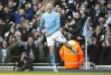 Haaland reaches milestone as City win nine-goal thriller, Everton joy