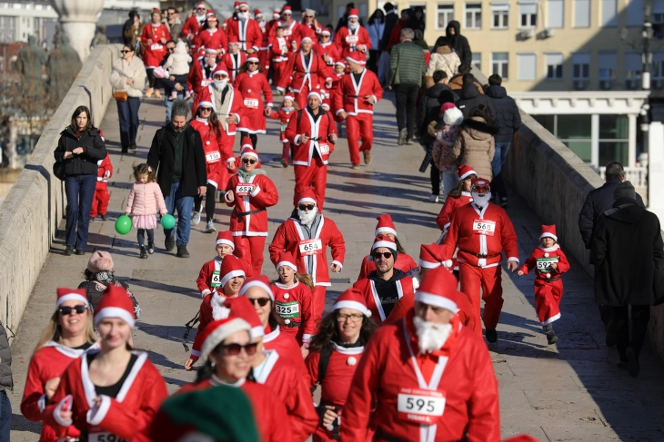 Hundreds dressed as Santa Claus run through Skopje downtown
