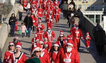 Hundreds dressed as Santa Claus run through Skopje downtown
