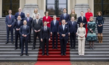 Netherlands swears in youngest, first openly gay prime minister